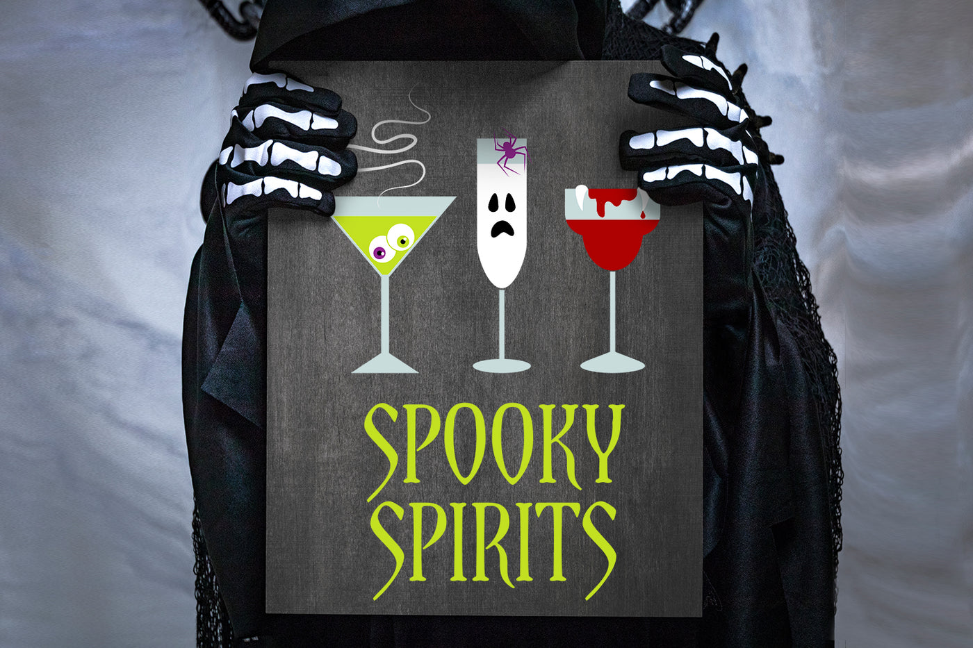 Person wearing skeleton gloves holding a sign with Halloween-themed cocktails and 'Spooky Spirits' text.