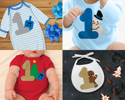 Collage of 4 images. Each features an article of baby clothing with a large 1 on it and a decorative element. The top left has a dreidel, the top right has a snowman, the bottom left has a Christmas tree and dreidel, and the bottom right has a gingerbread man.