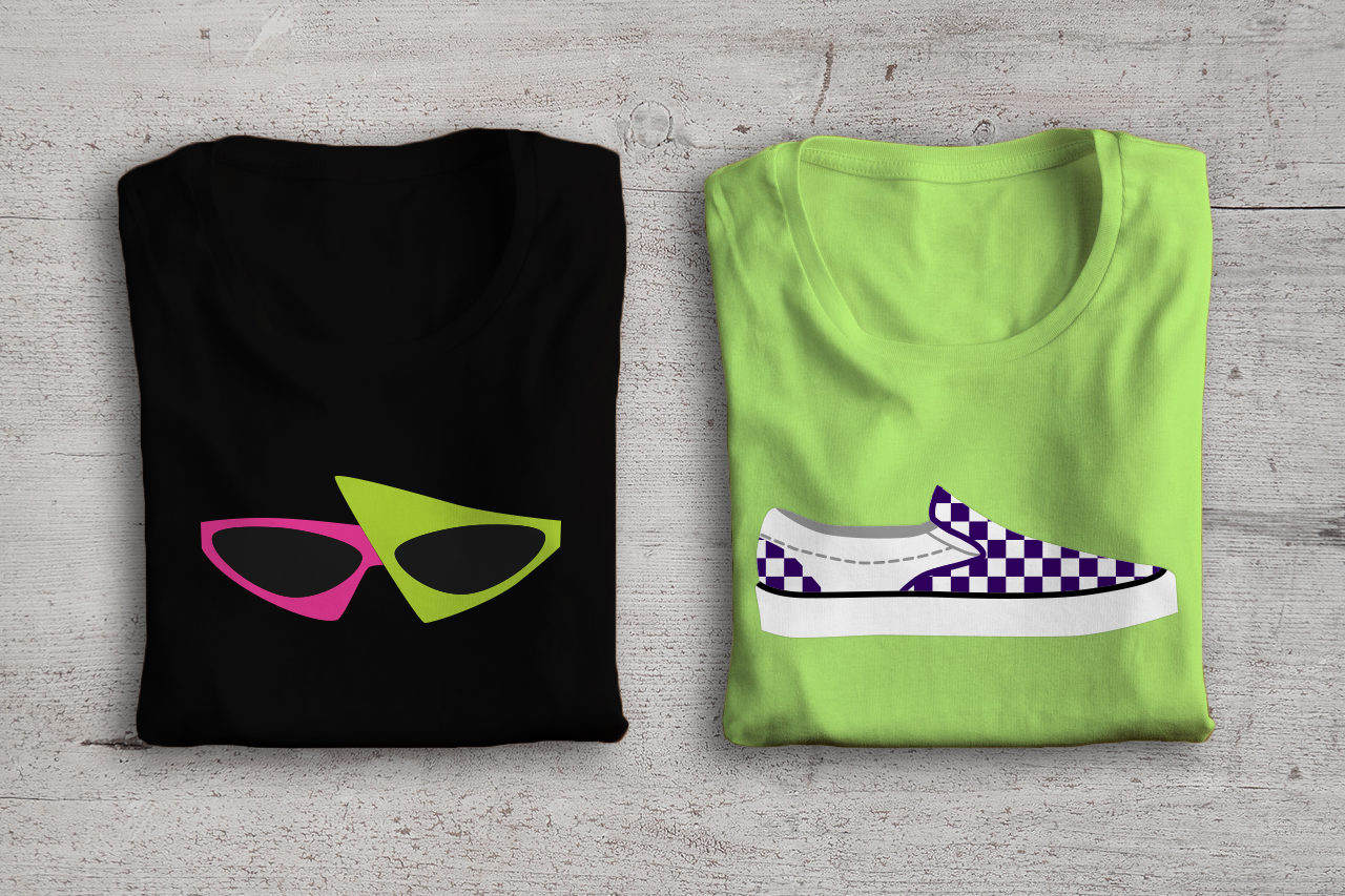 Two folded shirts on a cement background. One shirt has a pair of New Waves style 80s sunglasses. The other shirt has a Vans style skating shoe with a checkerboard pattern.
