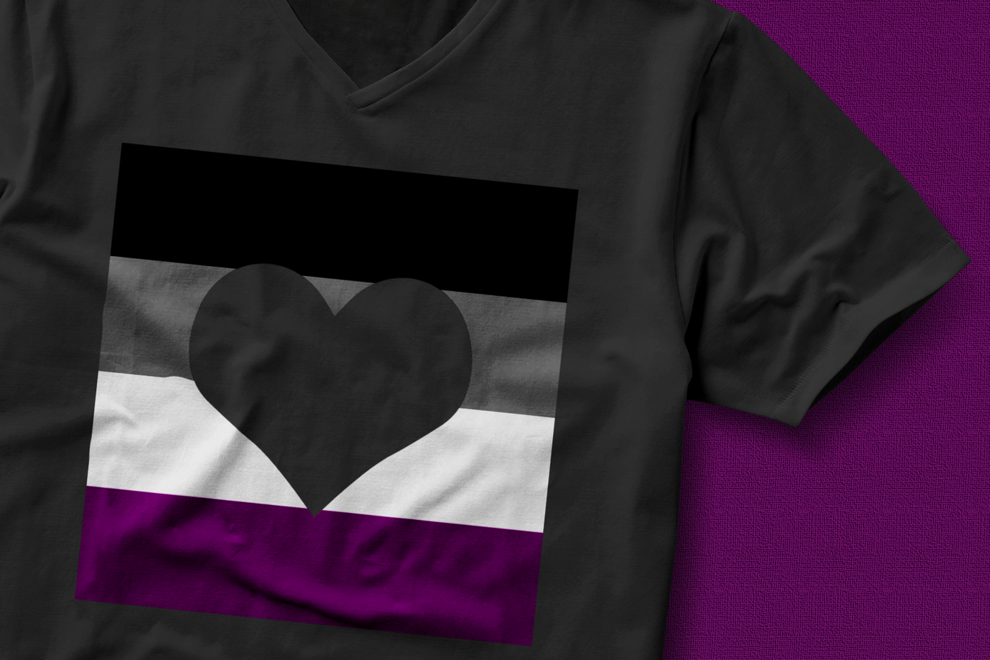Shirt with a square striped design in the color of a pride flag and a heart in the middle.