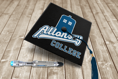 Graduation cap that says "Allons-y college" with the top of a phone box.