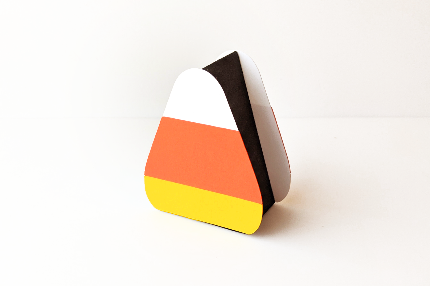 Candy corn shaped gift box SVG design