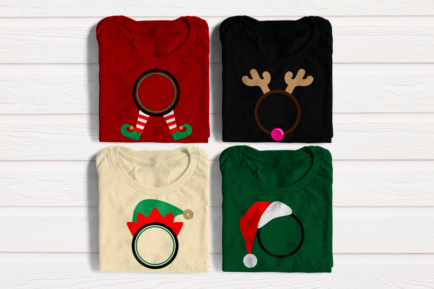 Four folded tees in Christmas colors. Each has a round monogram frame. The included frame designs are elf legs, an elf hat, reindeer horns and nose, and a Santa hat.