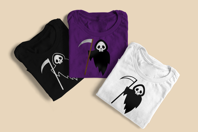 Three folded tees, each featuring an adorable grim reaper design.