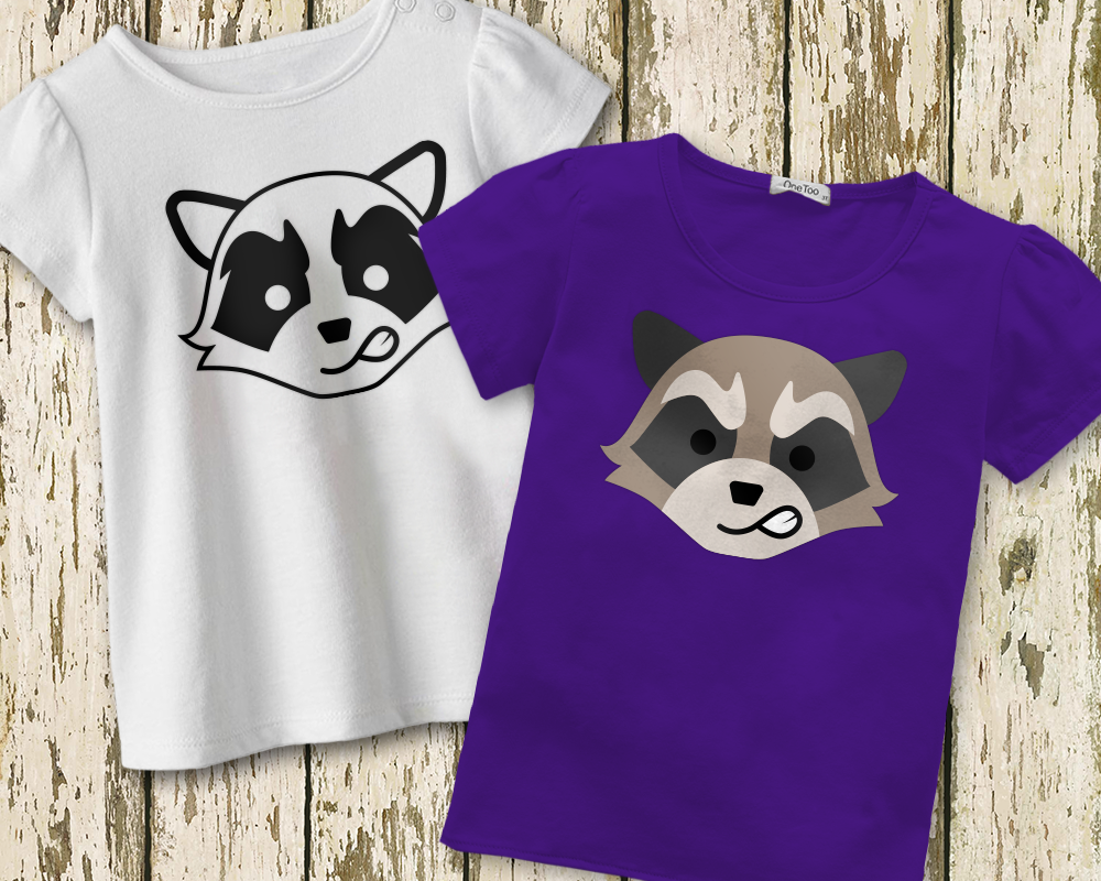 Two tees, each with a design of a raccoon face with a snarled mouth.