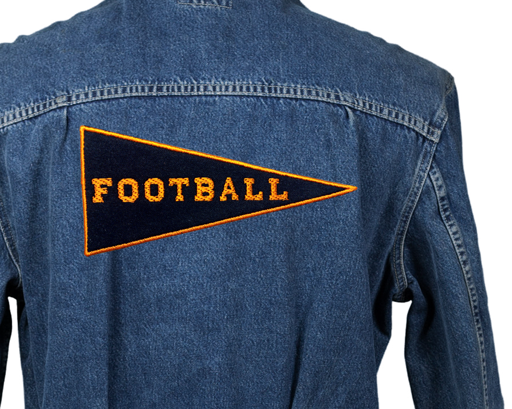 Denim jacket with an applique triangular pennant that says "Football"