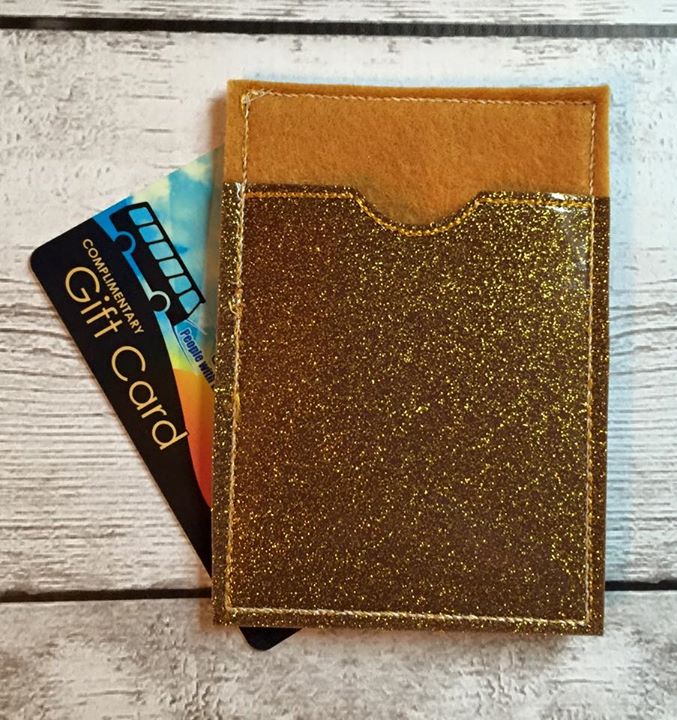 Gift card holder made out of gold vinyl.