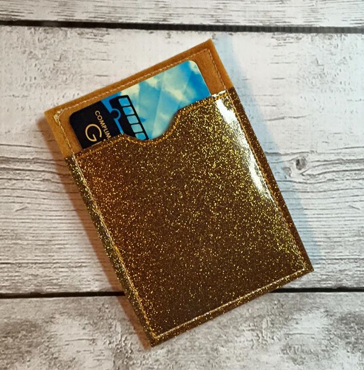 Gift card holder made out of gold vinyl.