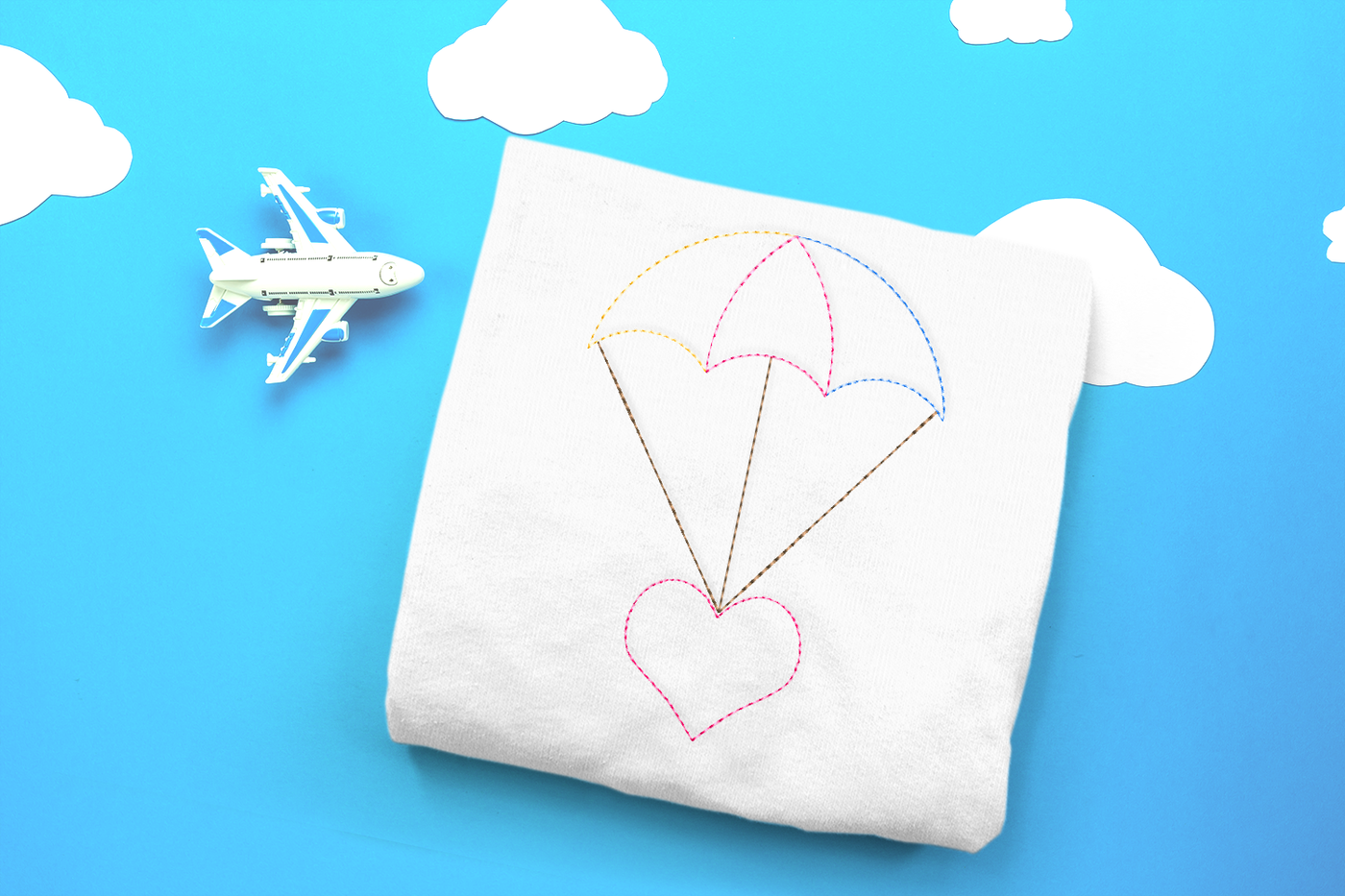 Heart parachute linework embroidery design