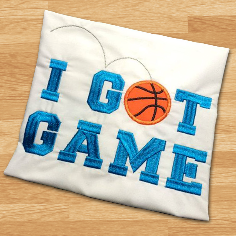 Applique design that says "I got game." The O is an applique bouncing basketball.
