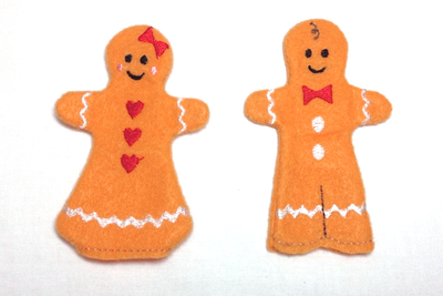 A gingerbread boy and girl finger puppet.