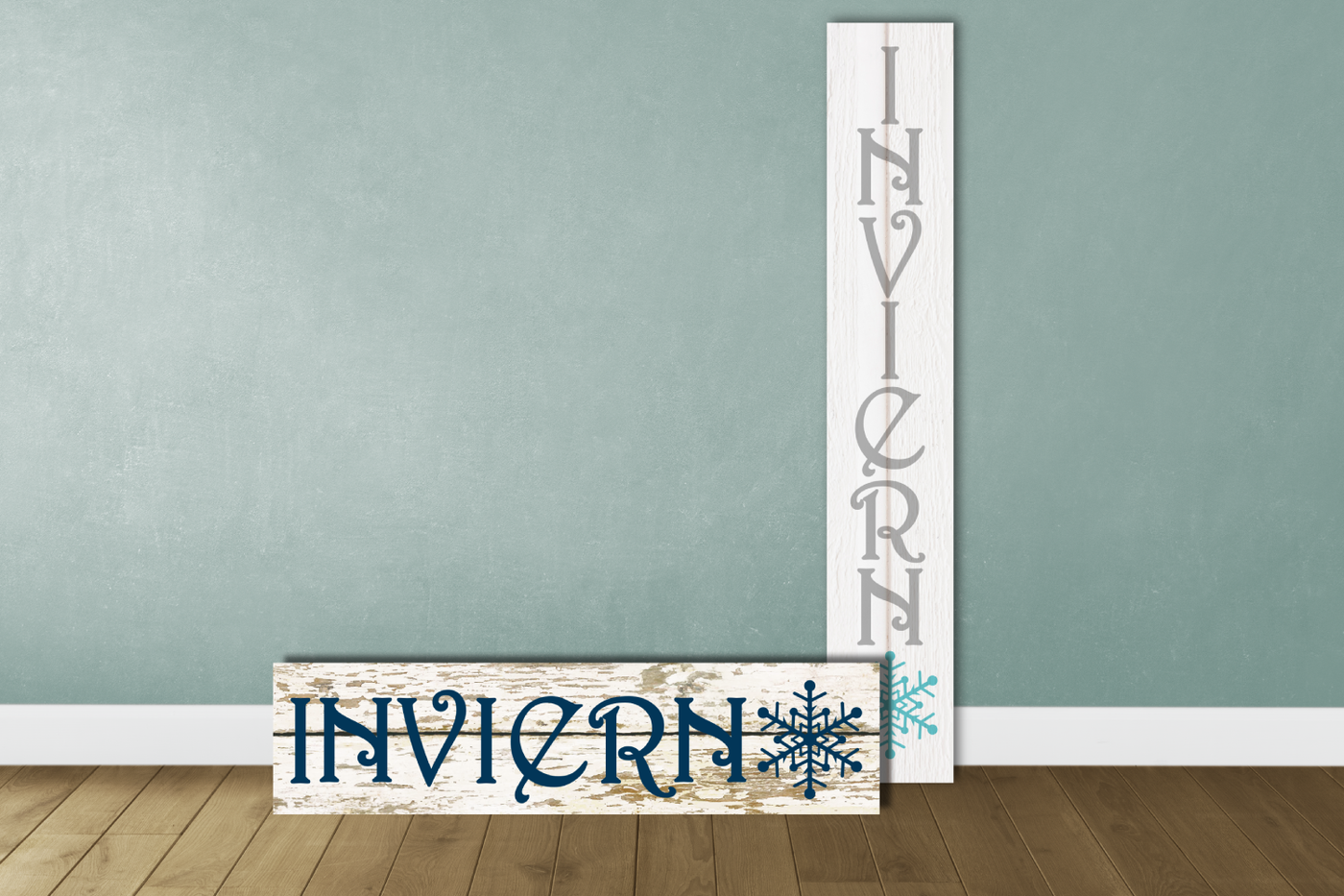 A horizontal and a vertical wooden sign. Each says "Invierno" with a snowflake in place of the O.