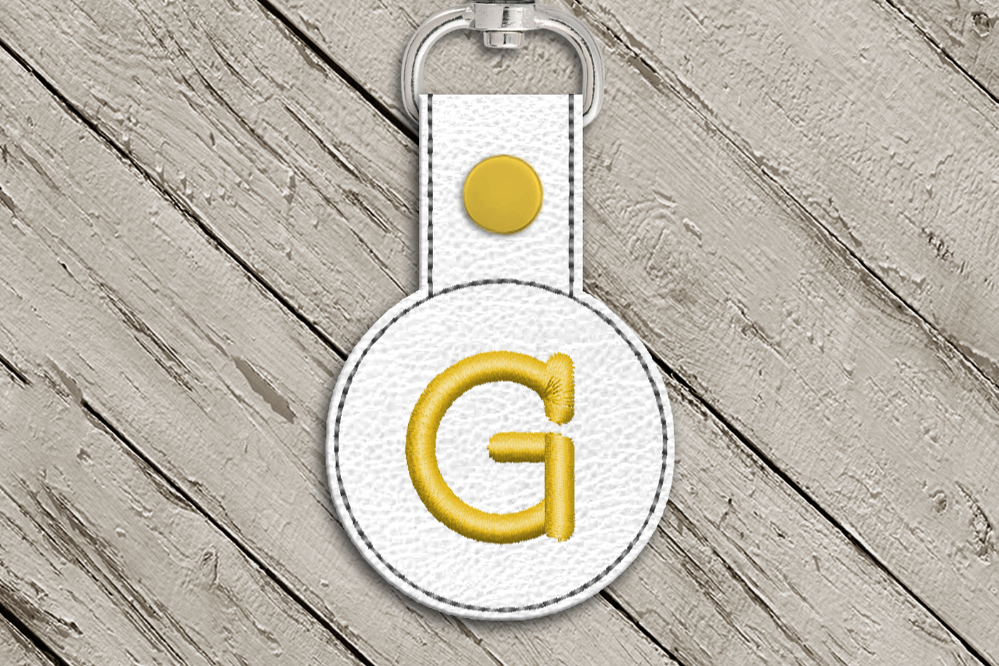 Letter G in the hoop key fob design
