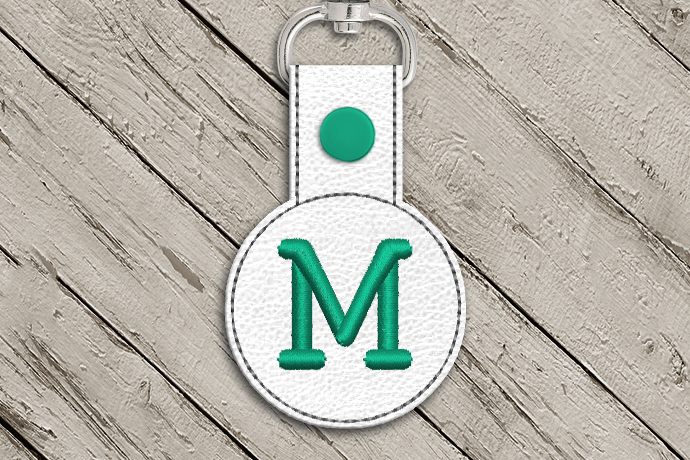 Letter M in the hoop key fob design