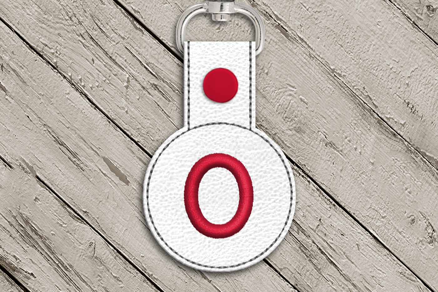 Letter O in the hoop key fob design
