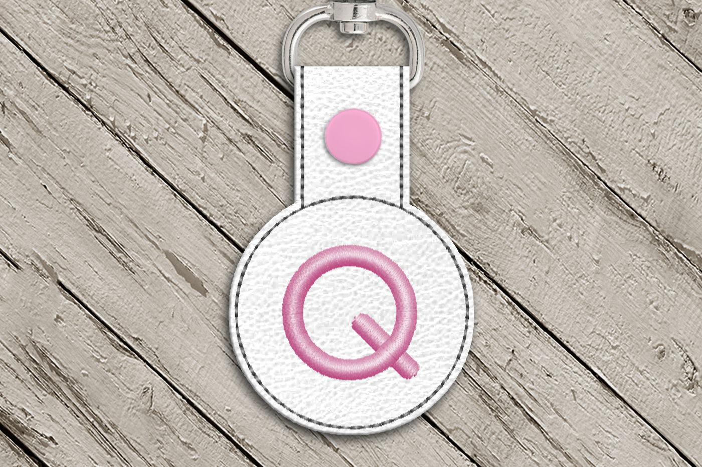Letter Q in the hoop key fob design