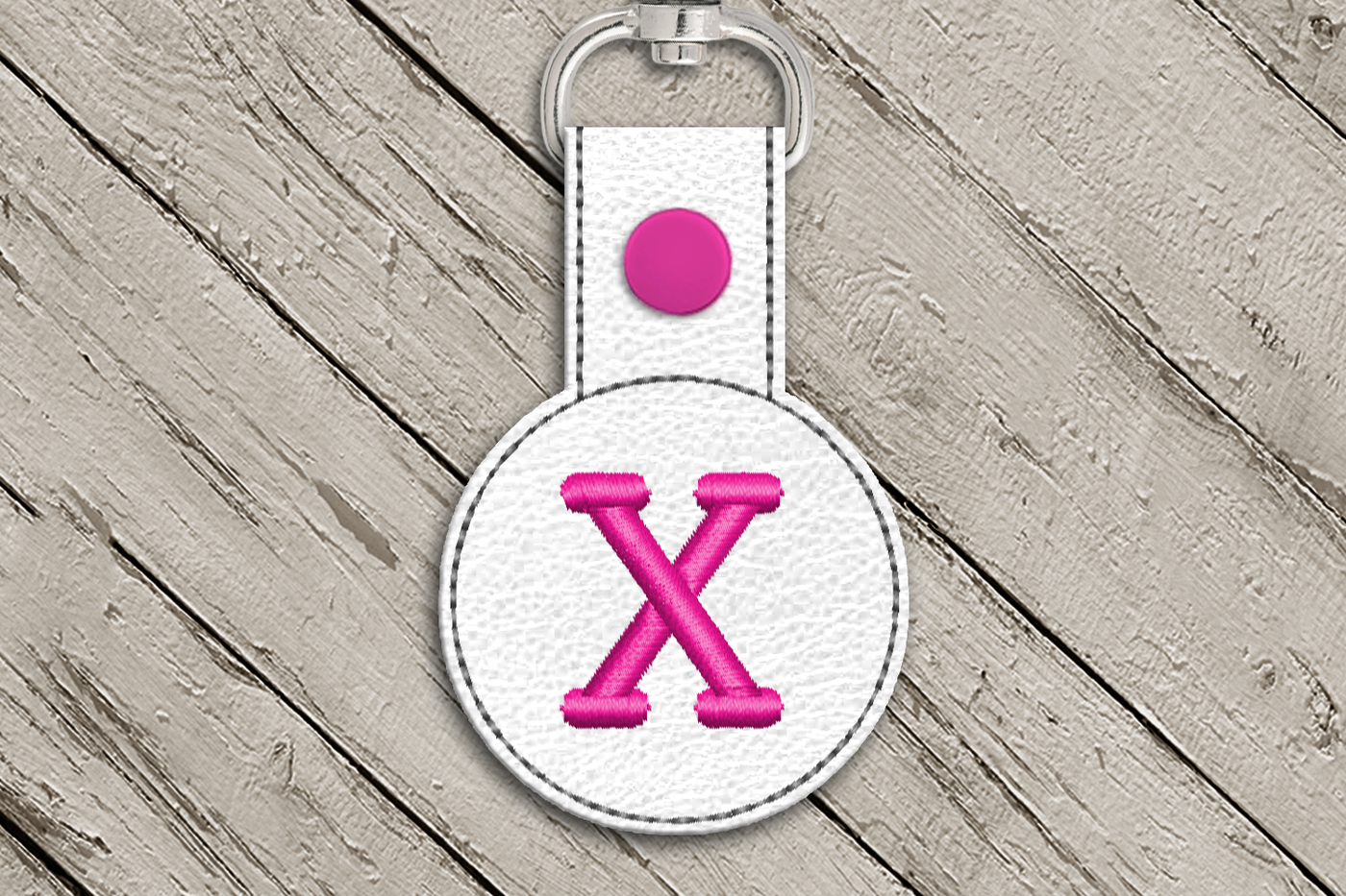 Letter X in the hoop key fob design