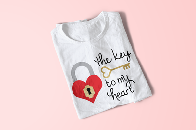 Shirt that says "the key to my heart" with a heart shaped lock and a heart skeleton key.