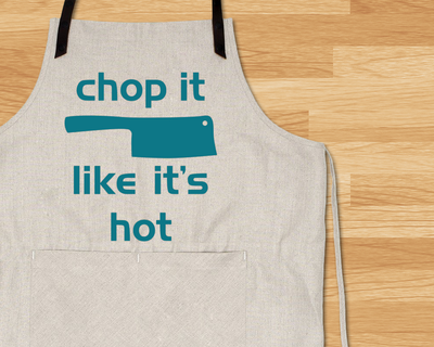 Apron with a butcher knife that says "chop it like it's hot."