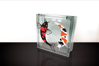 Glass block with 2 swimming koi fish.