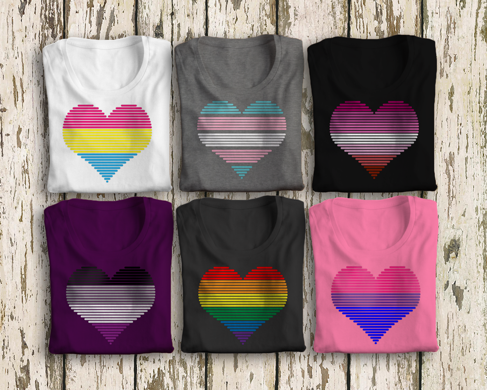 6 folded shirts, each with a heart made out of stripes in different pride flag colors.