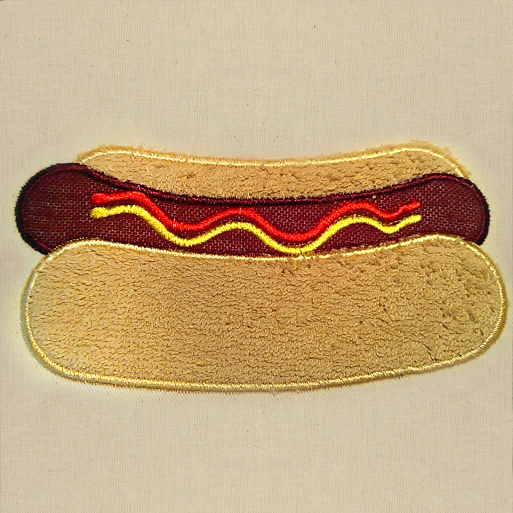 Hot dog applique with ketchup and mustard
