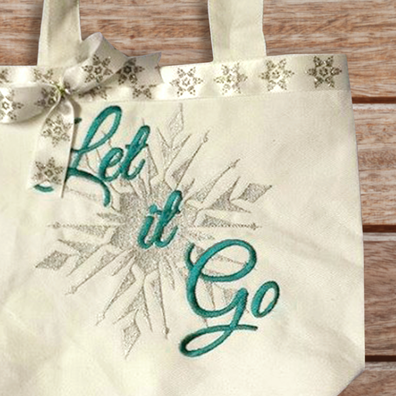 Embroidered snowflake with the phrase "Let it Go" on top