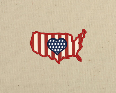 Applique of the United States with a heart in the middle.