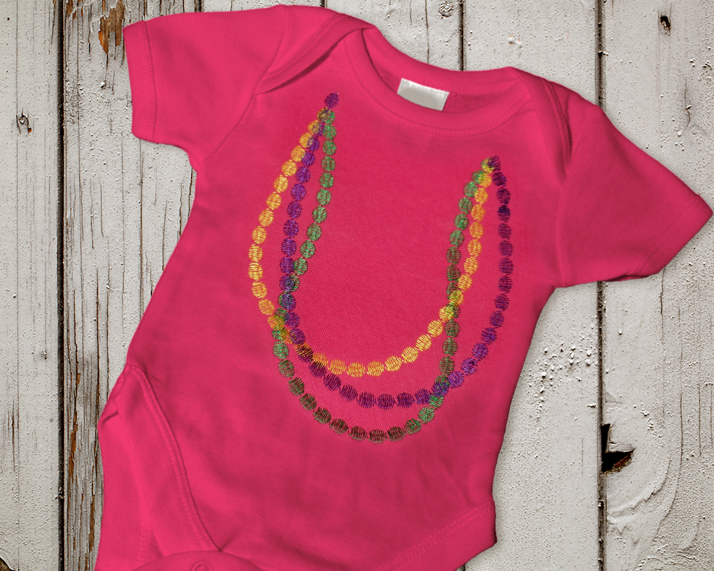 Onesie with embroidered Mardi Gras beads