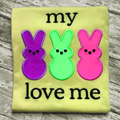 Applique of 3 bunnies that complete the phrase "my [peeps] love me."