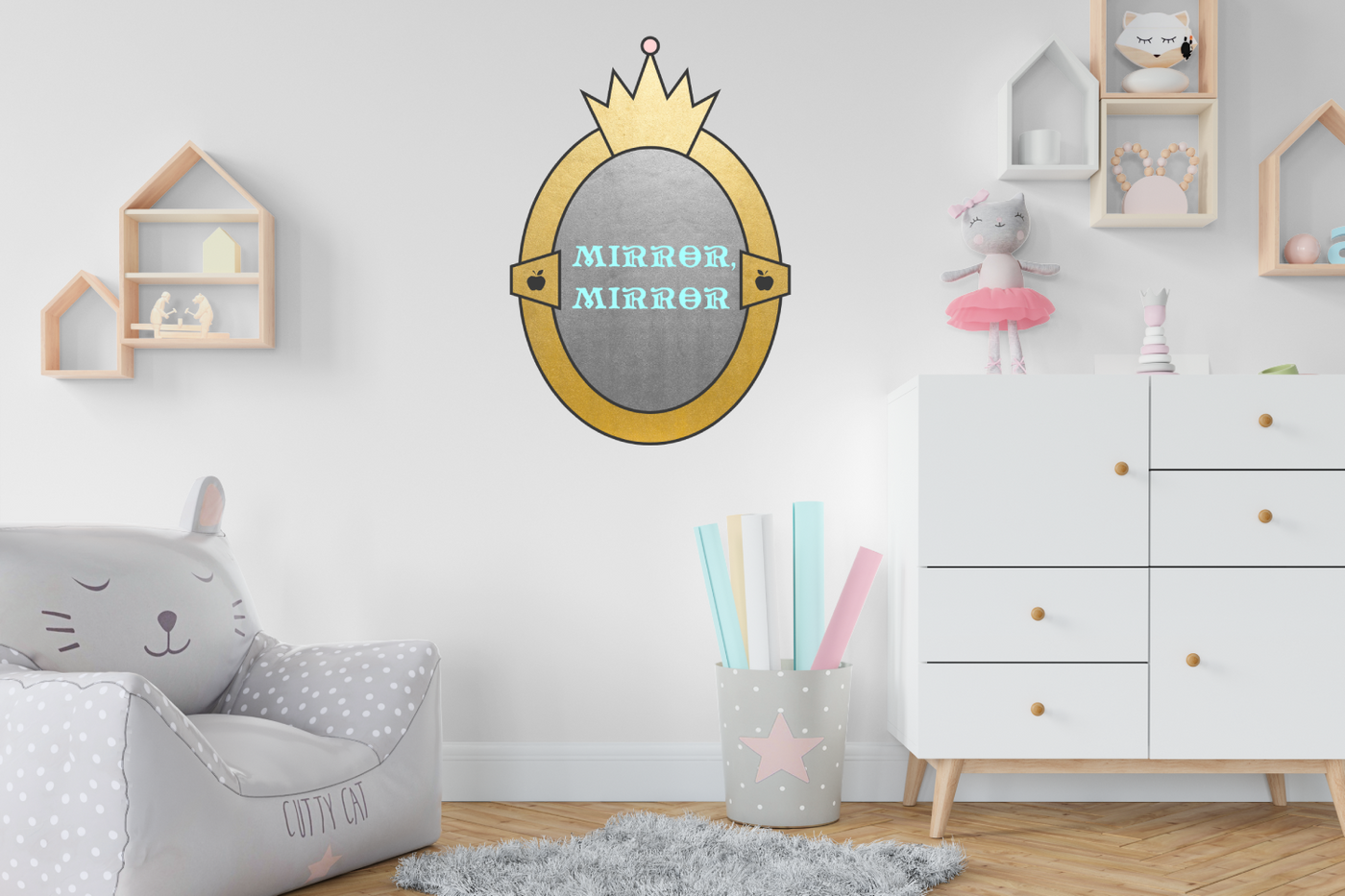 Child's room with a wall decal of a gold mirror that says "mirror, mirror."