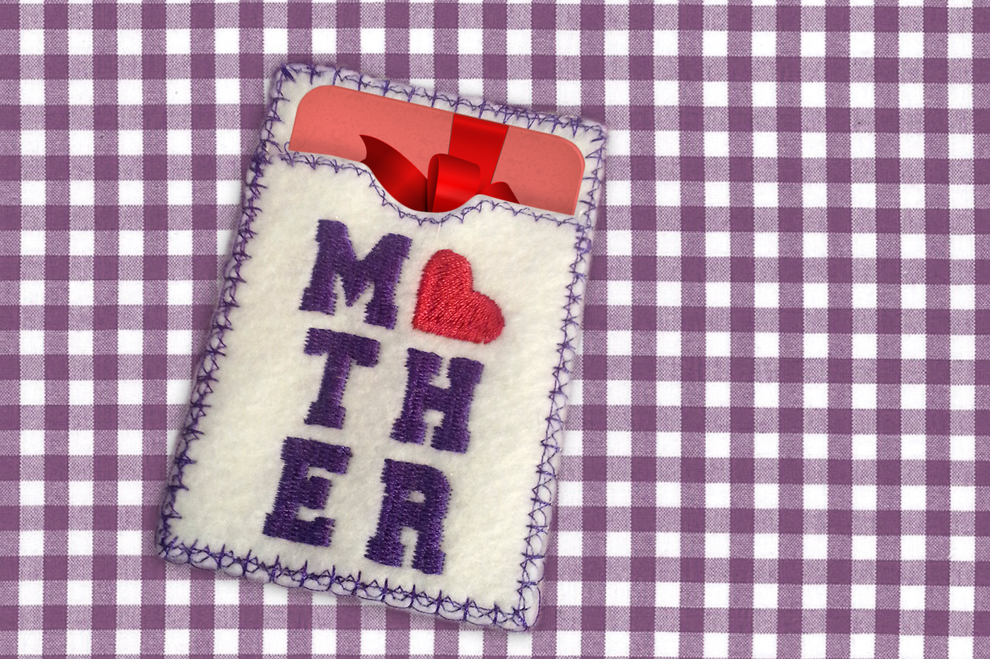 Felt gift card holder with the word "Mother" embroidered onto it. The word is split into 3 lines, and the O is a heart.
