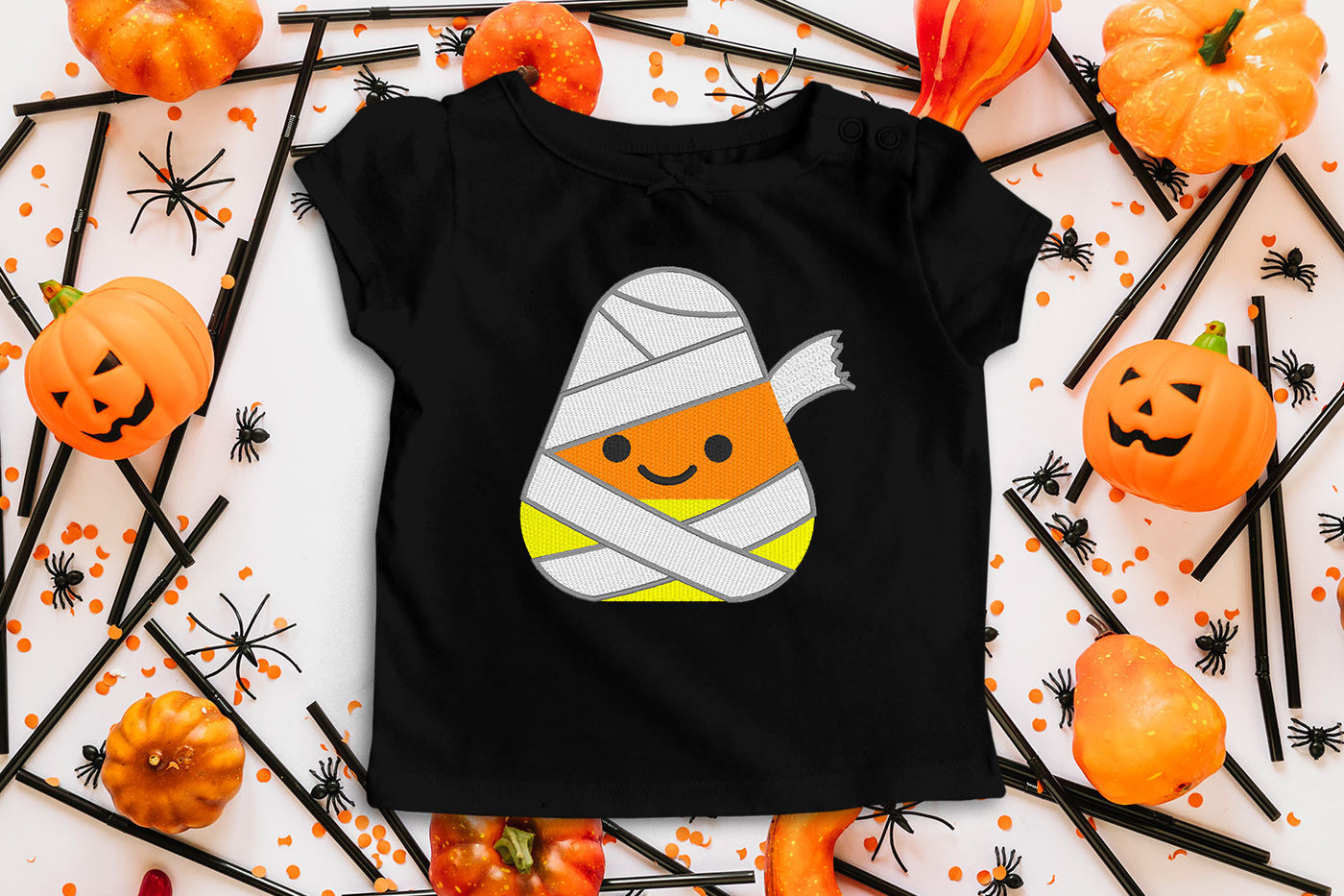 candy corn dressed as Mummy embroidery design file