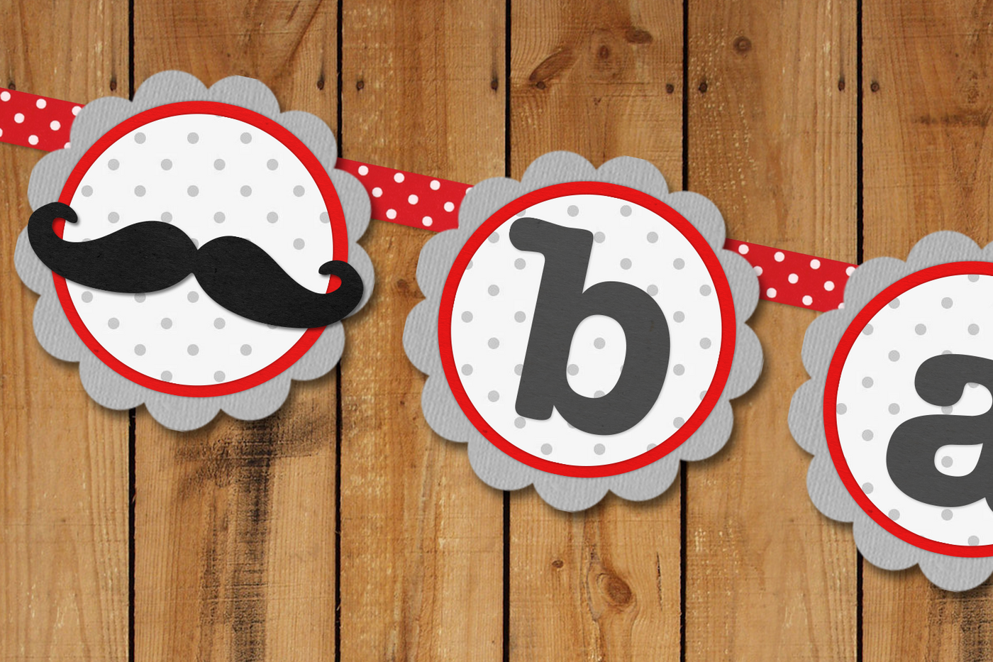 Party banner with scalloped circles and a mustache.