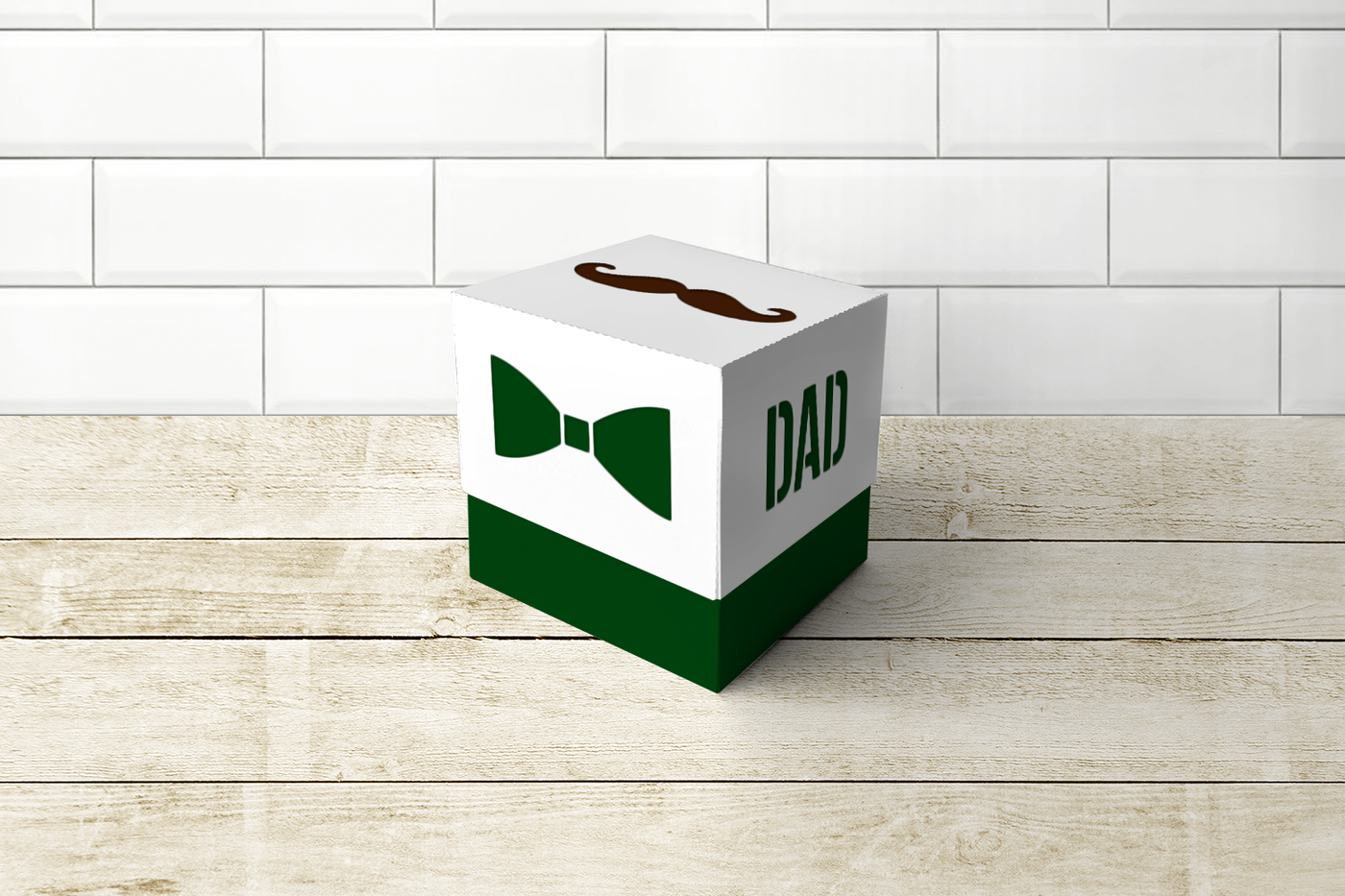 Gift box SVG design with mustache, bow tie, and DAD cutouts.