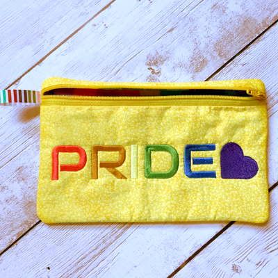Embroidery design that says "PRIDE" with a heart