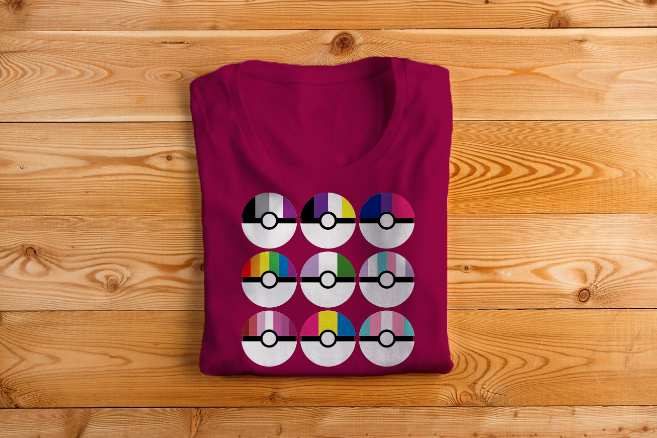 9 balls on a teeshirt. Each ball is white on the bottom with a horizontal black stripe in the middle. The top half of each ball has vertical stripes in various pride flag colors.