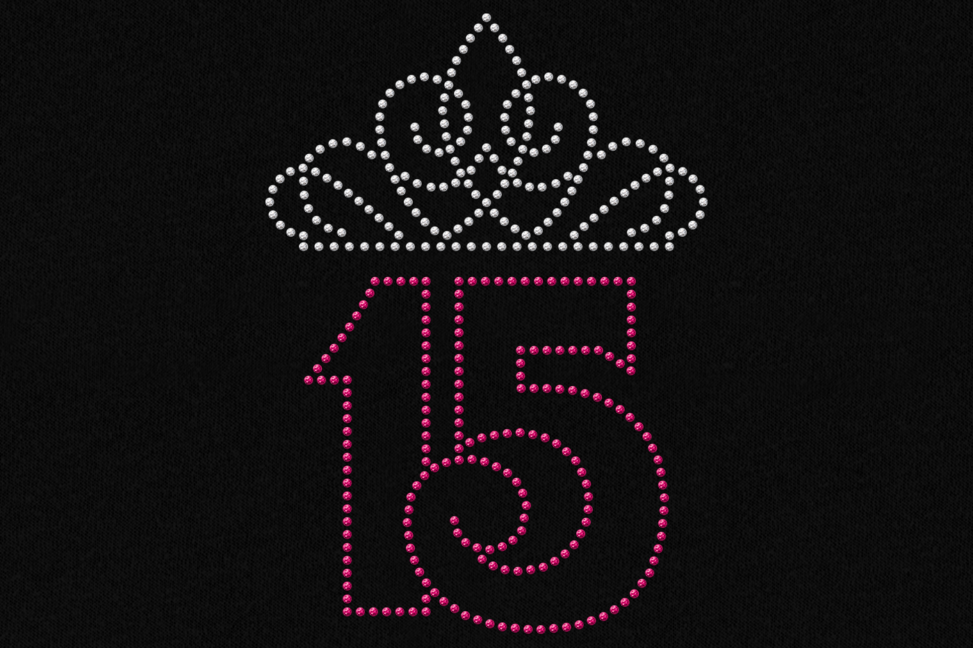 Closeup of a rhinestone design on black fabric. There is a 15 in hot pink rhinestones with a tiara in clear rhinestones above.