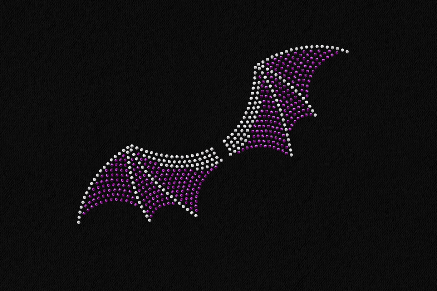 Black fabric with clear and purple rhinestones forming  a pair of bat wings