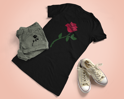 A black tee with a rose design. A pair of shorts also has a rose design, but in all black. A pair of converse sneakers lay to the side.
