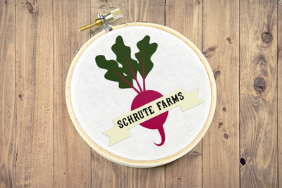 Beet design with a ribbon that says "Schrute Farms"
