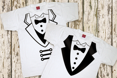 Two white tees decorated to look like fancy tuxedos.