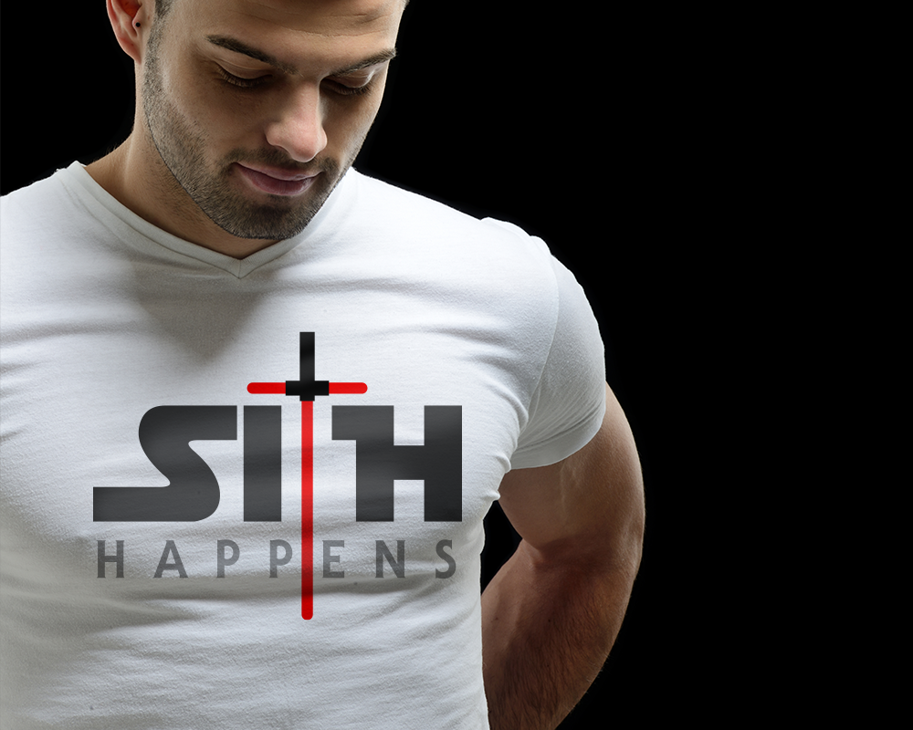A white man wears a shirt that says "Sith happens"