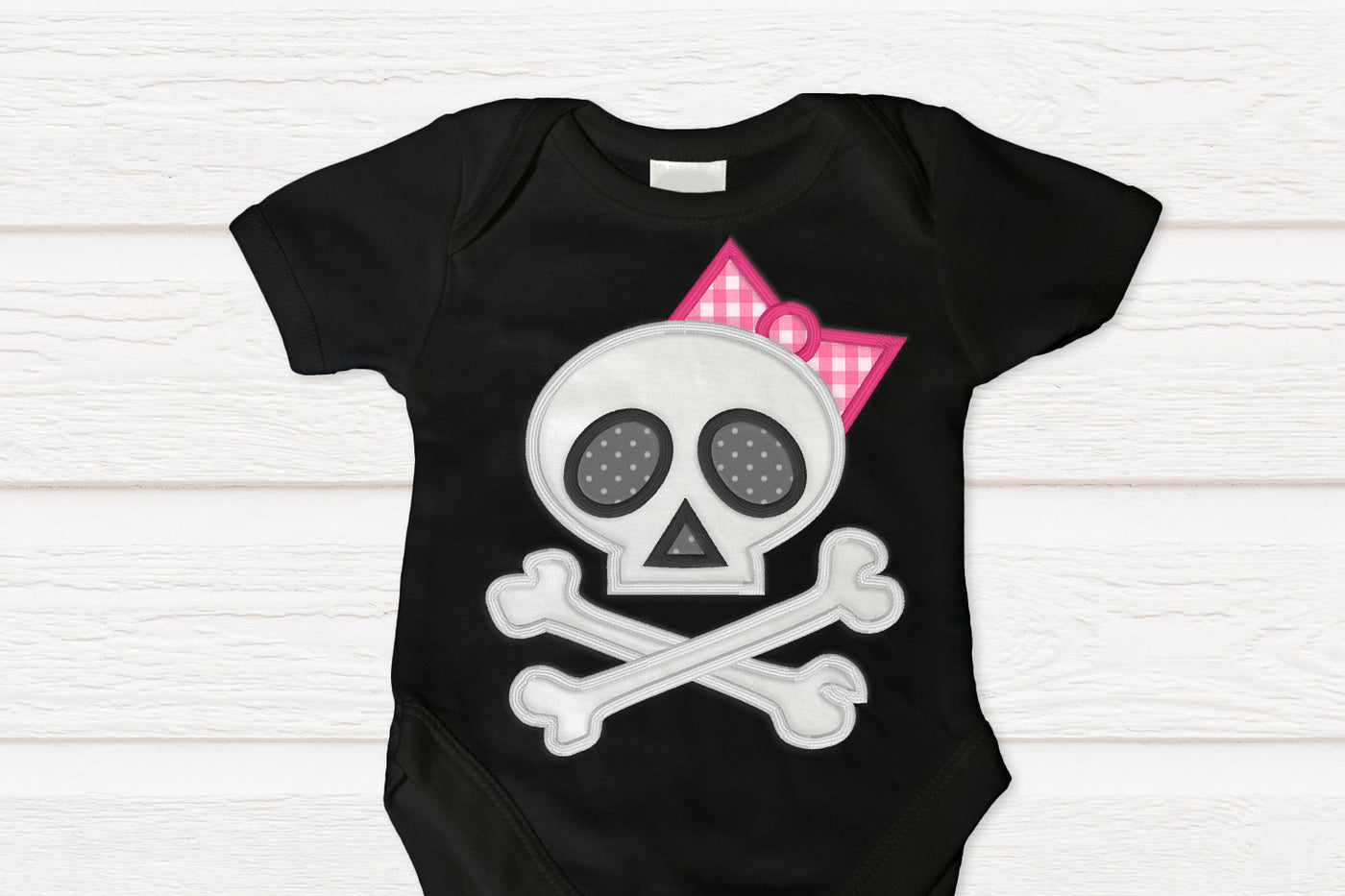 Skull and crossbones with bow applique embroidery design file