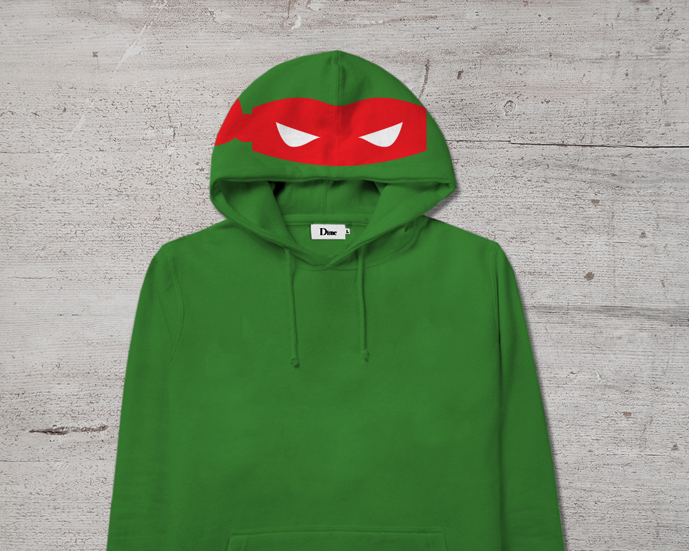 Green hoodie with a red blindfold mask design