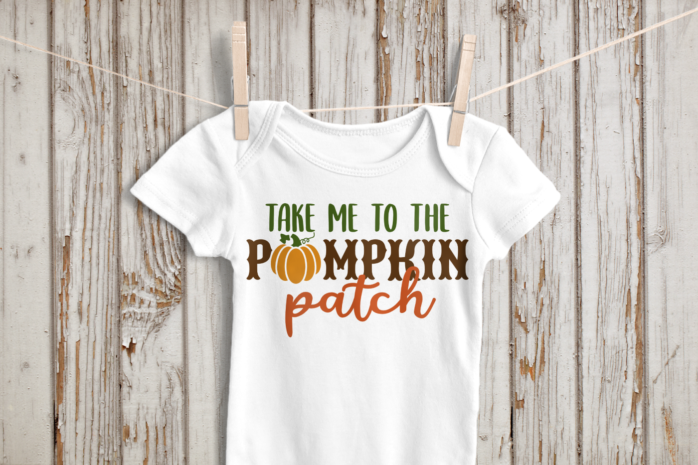 Design that says "take me to the pumpkin patch with a pumpkin in place of the U.