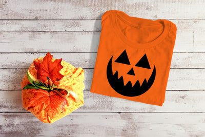 pumpkin face on a shirt