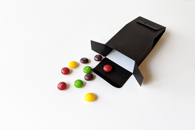 Tuxedo box design holding candy
