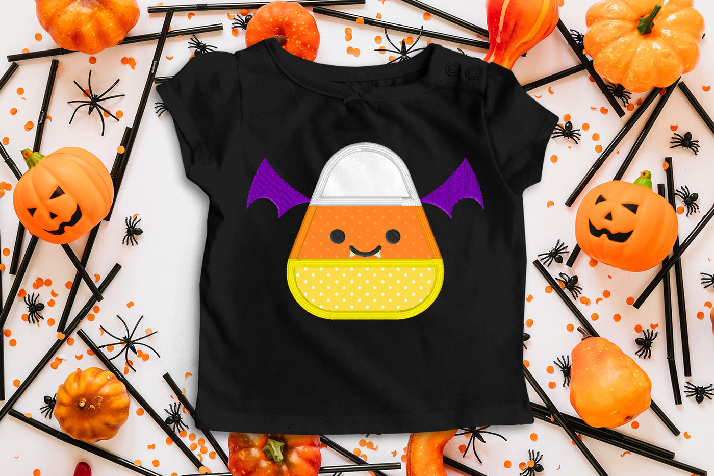 candy corn dressed up as vampire bat applique embroidery design file