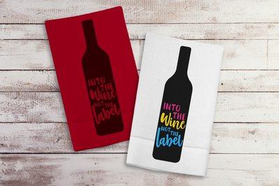 Wine bottle design that says "into the wine not the label."